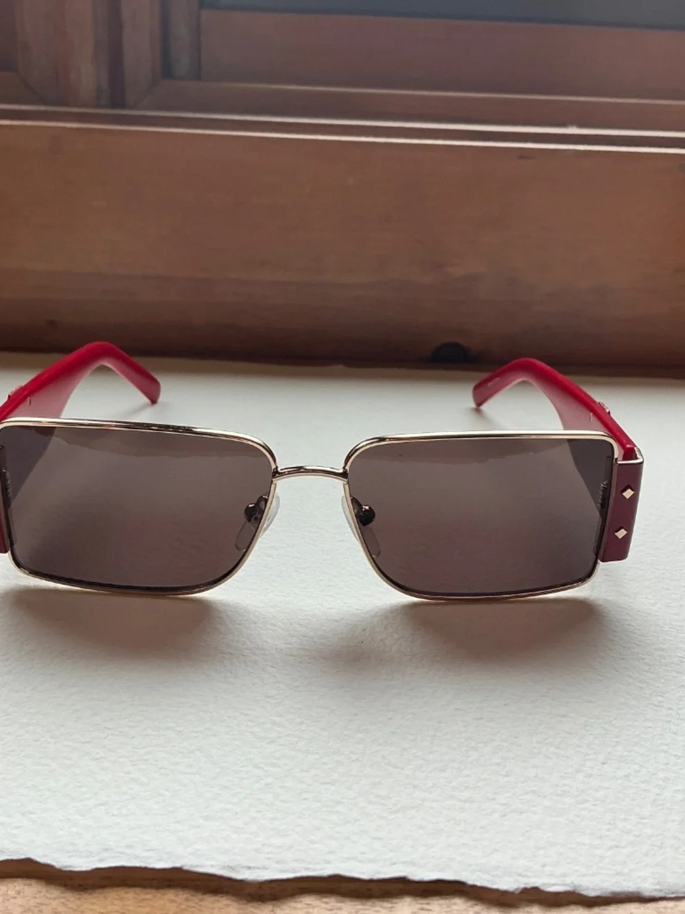 MCM Red and Gold Shield Sunglasses with crossbody case